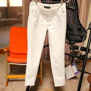 Ivory white stretch trousers by Ivanka Trump.